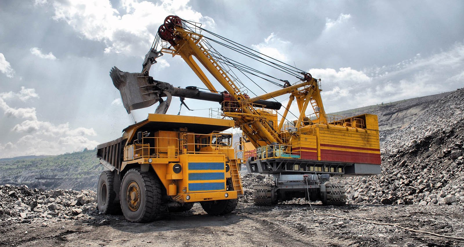 Loading Ore Into Dump Truck for Mining